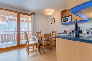 Appart'hotels Madame Vacances Residence Le Parc Des Airelles : photos des chambres