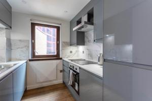 Stunning 1 Bed Merchant City Apartment with Parking