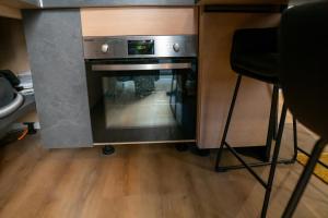 Appartements studio coeur de ville neuf et design tt equipe parking gratuit : photos des chambres