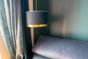 Appartements coeur de ville t2, terrasse, clim tt equipe, parking : photos des chambres