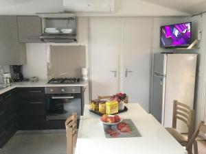 Maisons de vacances Mobil-home Camping au MATHES : photos des chambres