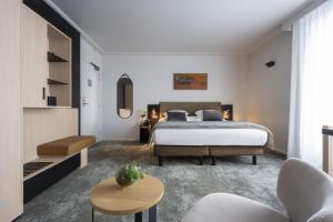 Hotels Best Western Premier Le Masq Hotel : Suite Lit King-Size Balnéo avec Balcon