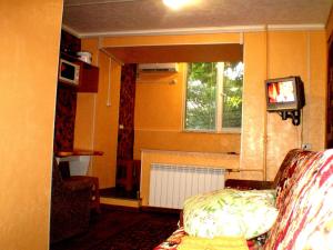 One-Bedroom Apartment room in Небольшая студия пр. Центральный 148 1этаж-9этажного дома WI-FI 2 дивана и 2 кресла