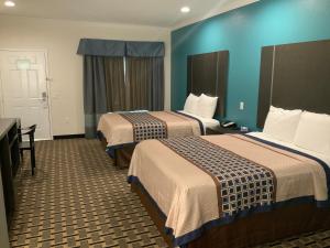 Queen Room with Two Queen Beds - Non-Smoking room in Regency Inn & Suites- NW Houston