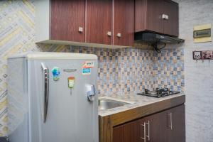 Relieved 1BR Apartment at Serpong Greenview By Travelio