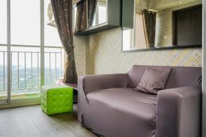 Relieved 1BR Apartment at Serpong Greenview By Travelio