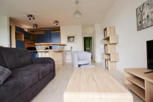 Appartements 70 m2 avec Balcons et Parking : photos des chambres