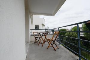 Appartements 70 m2 avec Balcons et Parking : photos des chambres