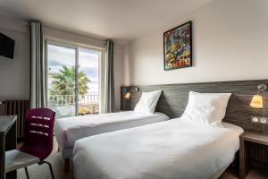 Hotels Hotel du Midi Plage : photos des chambres