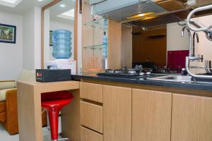 Fully Furnished and Cozy 2BR at Bassura City Apartment By Travelio