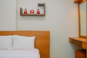 Fully Furnished and Cozy 2BR at Bassura City Apartment By Travelio