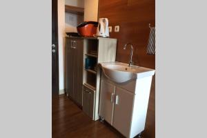 Grand Dhika Apartement by 2325 Studio room with cozy wooden style room