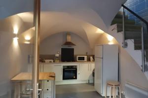 Appartements Maison de bourg : photos des chambres