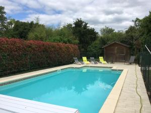 Maisons de vacances LA GRANGE DE BELLEFONTAINE et sa piscine privee : photos des chambres