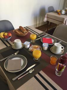 B&B / Chambres d'hotes Un jardin en ville : photos des chambres