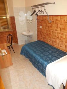 Camera Singola con Bagno in Comune
