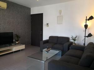 Loizou Holdings Flat 301