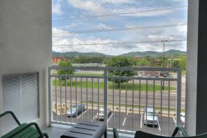 Queen Room with Two Queen Beds and Parkway Balcony - Non-Smoking room in Holiday Inn & Suites - Pigeon Forge Convention Center, an IHG Hotel