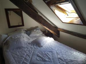 Sejours chez l'habitant maison en granit bleue : photos des chambres