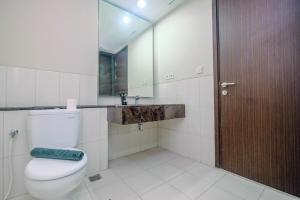 Cozy 2BR Apartment Nine Residence with City View By Travelio