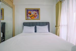 Modern Studio at Tifolia Apartment By Travelio