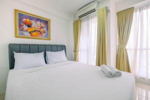 Modern Studio at Tifolia Apartment By Travelio