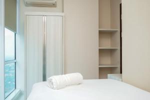 Chic and Spacious 2BR Apartment at Brooklyn Alam Sutera By Travelio