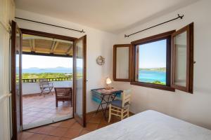 Spiaggia Bianca Pedra Rosa - Your House in Sardinia