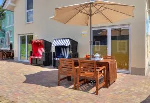 Haus Strandkörv mit Fass-Sauna - Stubbenfelde