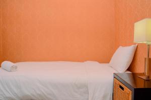 Modern and Luxurious 2BR Essence Dharmawangsa Apartment By Travelio