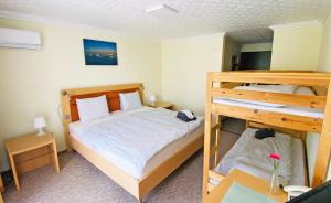 Standard Quadruple Room with Balcony room in Hotel Jonathan