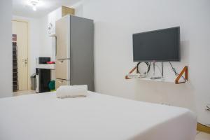 New Furnished with Cozy Stay Studio Apartment at M-Town Residence By Travelio