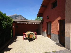 Appartements Maison mitoyenne avec terrasse : photos des chambres