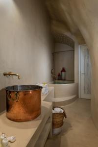 Executive Cave Suite with heated Hot Tub ® room in Mythical Blue Luxury Suites