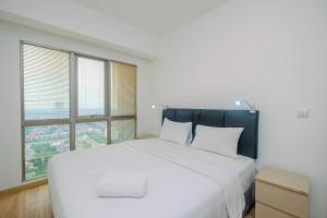 Brand New 1BR Apartment at M-Town Signature By Travelio