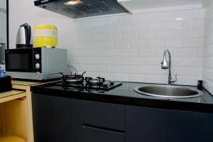 Beautiful and Cozy 2BR above Mall at Bassura City Apartment By Travellio