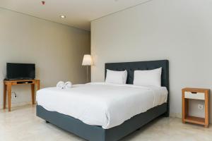 Elegant 2BR with Private Lift at Masterpiece The Epicentrum Kuningan Apartment By Travelio