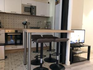 Appartements Le jardin des Capucins : photos des chambres