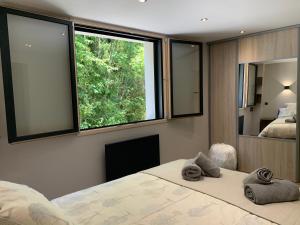 Appartements Aux Pierres Du Clos - Les 3 Vallees : photos des chambres