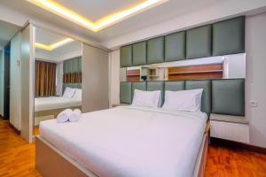 Cozy Studio Apartment at H Residence near MT Haryono By Travelio