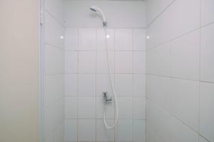 Comfortable and Homey Studio Apartment at Dramaga Tower near IPB By Travelio