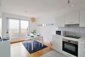 Appartements L'Opalin by Cocoonr - en plein coeur de Dinard : photos des chambres