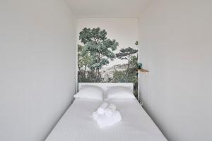 Appartements L'Opalin by Cocoonr - en plein coeur de Dinard : photos des chambres