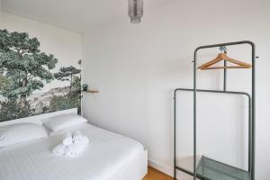 Appartements L'Opalin by Cocoonr - en plein coeur de Dinard : photos des chambres