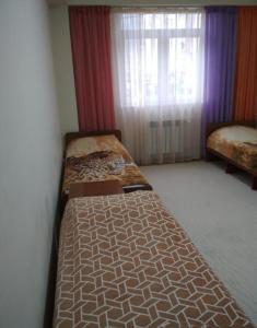 Two-Bedroom Apartment room in Apartment on Estonskaya 37