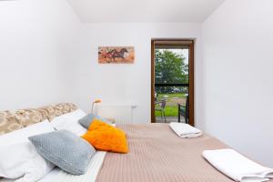 Zatoka Pucka - Wakacyjny Apartament z ogródkiem by Noclegi Renters