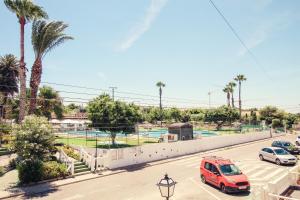 Costa Blanca Bungalow Lago jardin frente piscina 4 personas #PRP001 by Stay Orihuela Costa