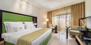 Double or Twin Room with City View room in Bahi Ajman Palace Hotel