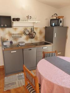 Two-Bedroom Apartment with Terrace and Sea View room in Apartments with a parking space Vidalici Pag - 9393
