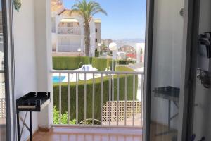 Apartment with pool, sea views & balcony less than 10min walk to La Mata Beach!